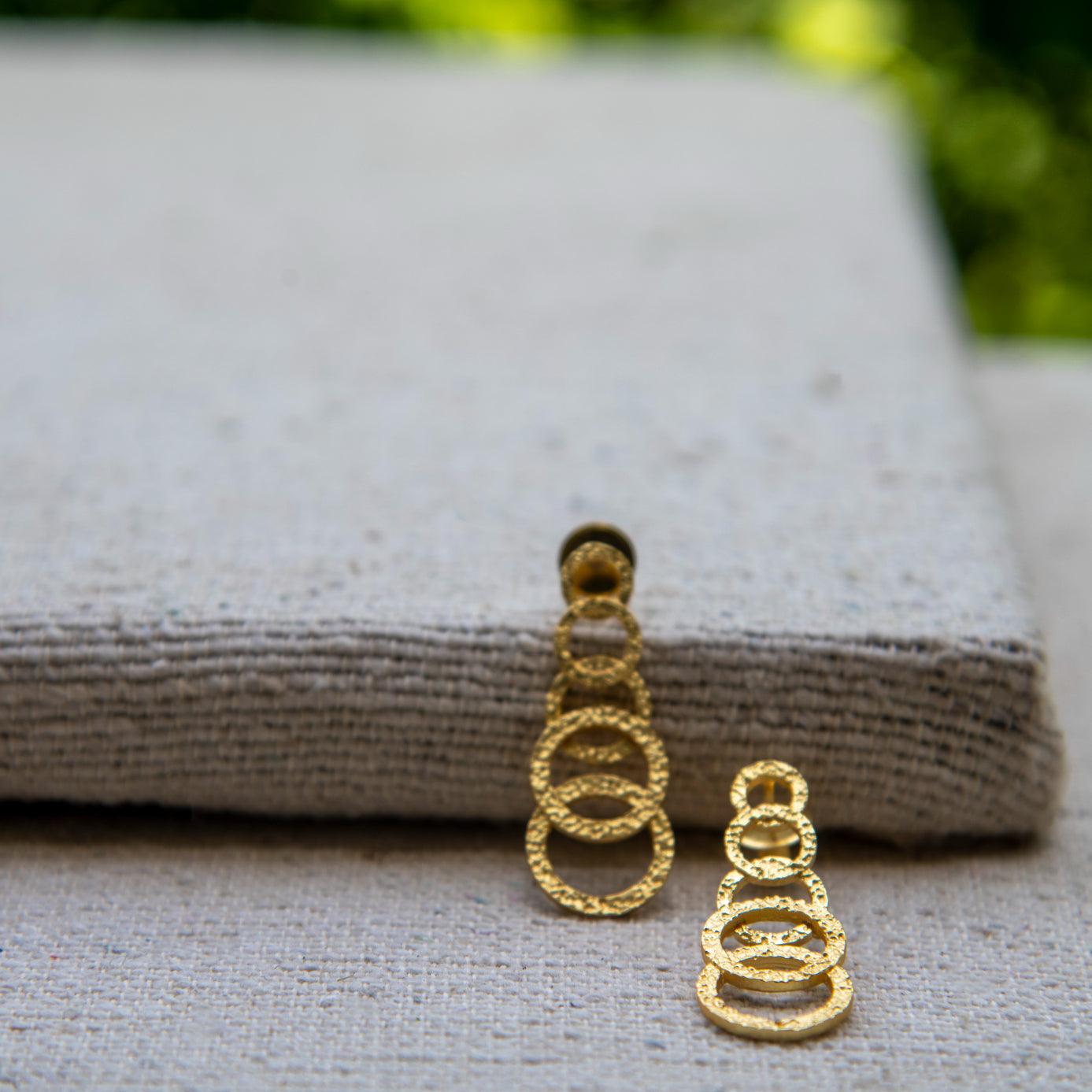 Hammered gold store stud earrings